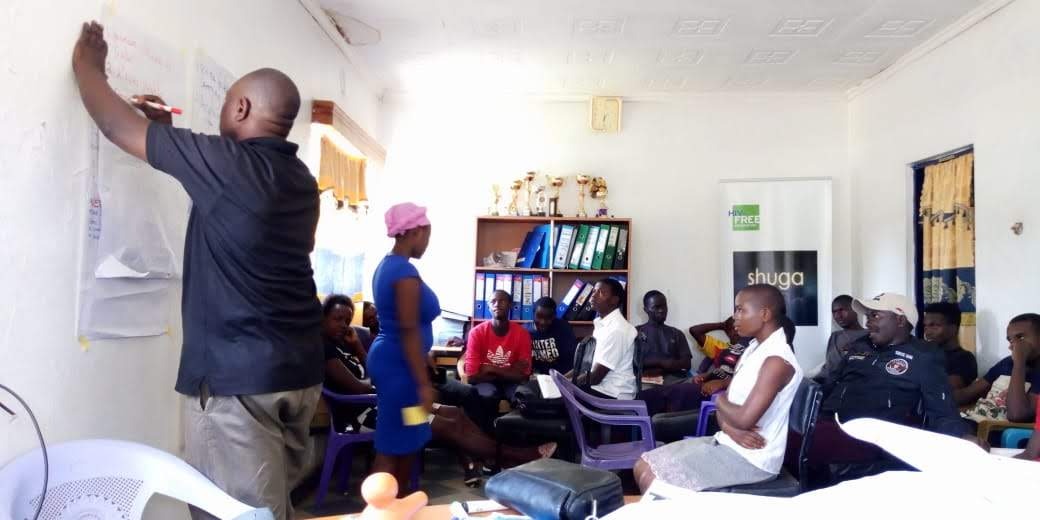 Empowered community members in training session
